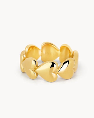 Anillo dorado ancho con corazones en relieve banda continua waterproof de Pialü