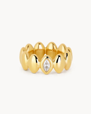 Anillo dorado ancho con óvalos en relieve y zircón marquesa central waterproof de Pialü