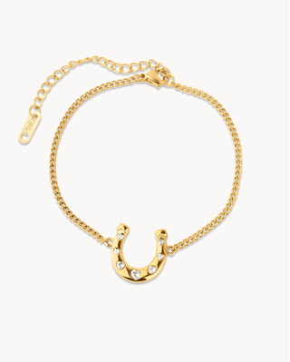 Pulsera dorada con dije herradura y zircones blancos, joya waterproof de Pialü