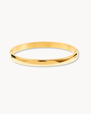 Pulsera sólida dorada lisa con cierre bisagra y logo Pialü grabado, joya waterproof de Pialü