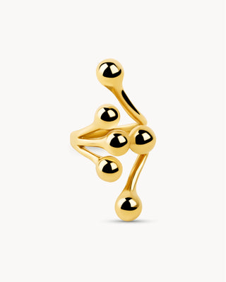 Anillo dorado artístico con ramas y bolitas en relieve diseño orgánico, joya waterproof de Pialü