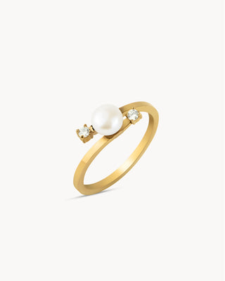 Anillo dorado abierto con perla blanca y dos zircones laterales, waterproof de Pialü