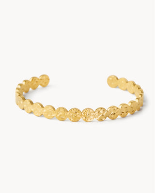 Brazalete rígido dorado con monedas circulares martilladas en relieve, joya waterproof de Pialü