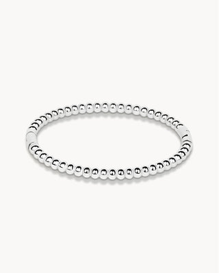 Pulsera elástica plateada con bolitas esféricas perfectas alineadas, joya waterproof de Pialü