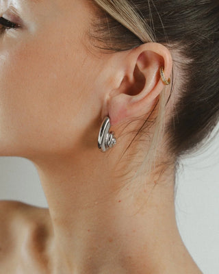 Aretes Silver karakola plateados con forma de caracola marina brillante, waterproof de Pialü