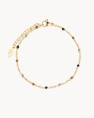Pulsera dorada con bolitas en tonos café y ámbar, joya waterproof de Pialü