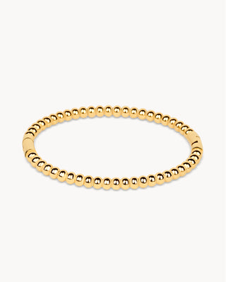 Pulsera elástica dorada con bolitas esféricas perfectas alineadas, joya waterproof de Pialü