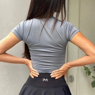 Top shape sculpt beige moldeador Pialü, detalle escote redondo y fit ceñido